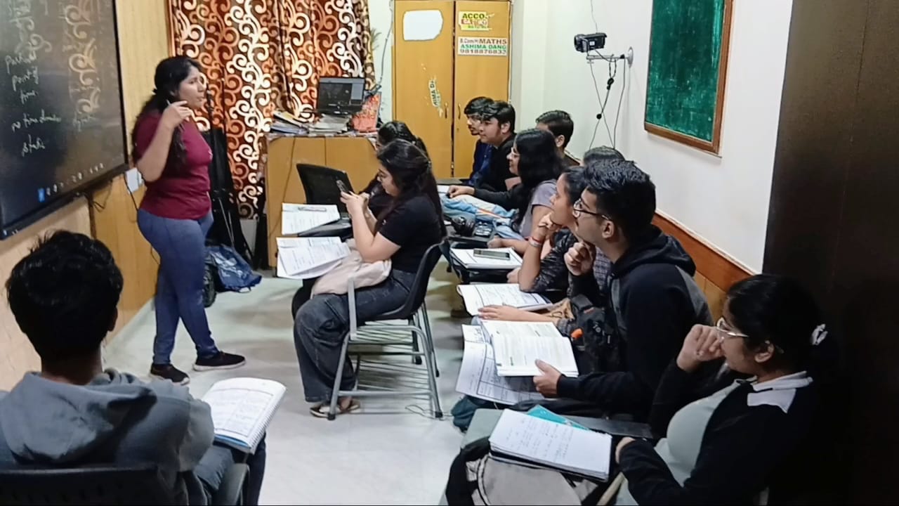 Ashima Dang teaching Economics at Sumit Dang Commerce Classes Rohini